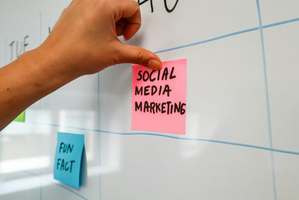 Sticky paper written social media on a whiteboard