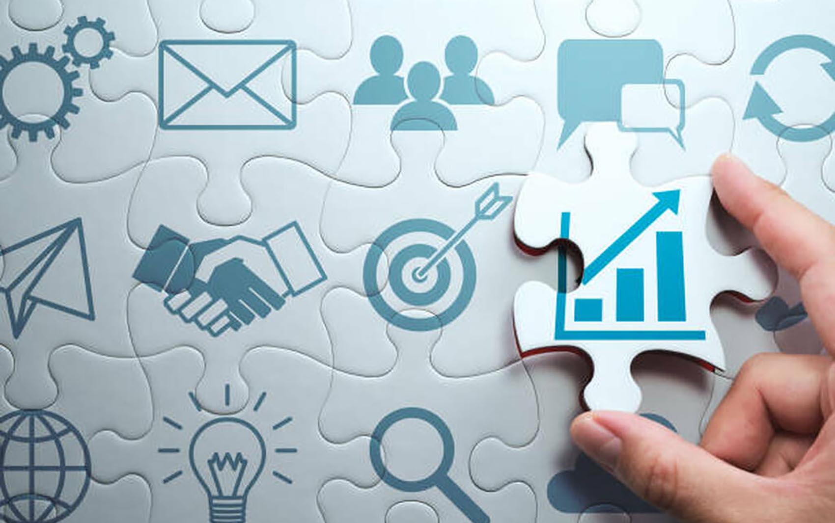 Connecting last jigsaw puzzle piece.